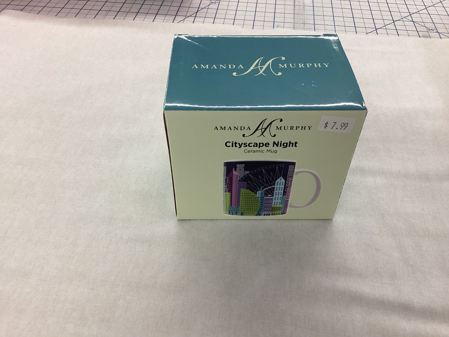 Cityscape Night Ceramic Mug - Black background with purple, green & blue buildings